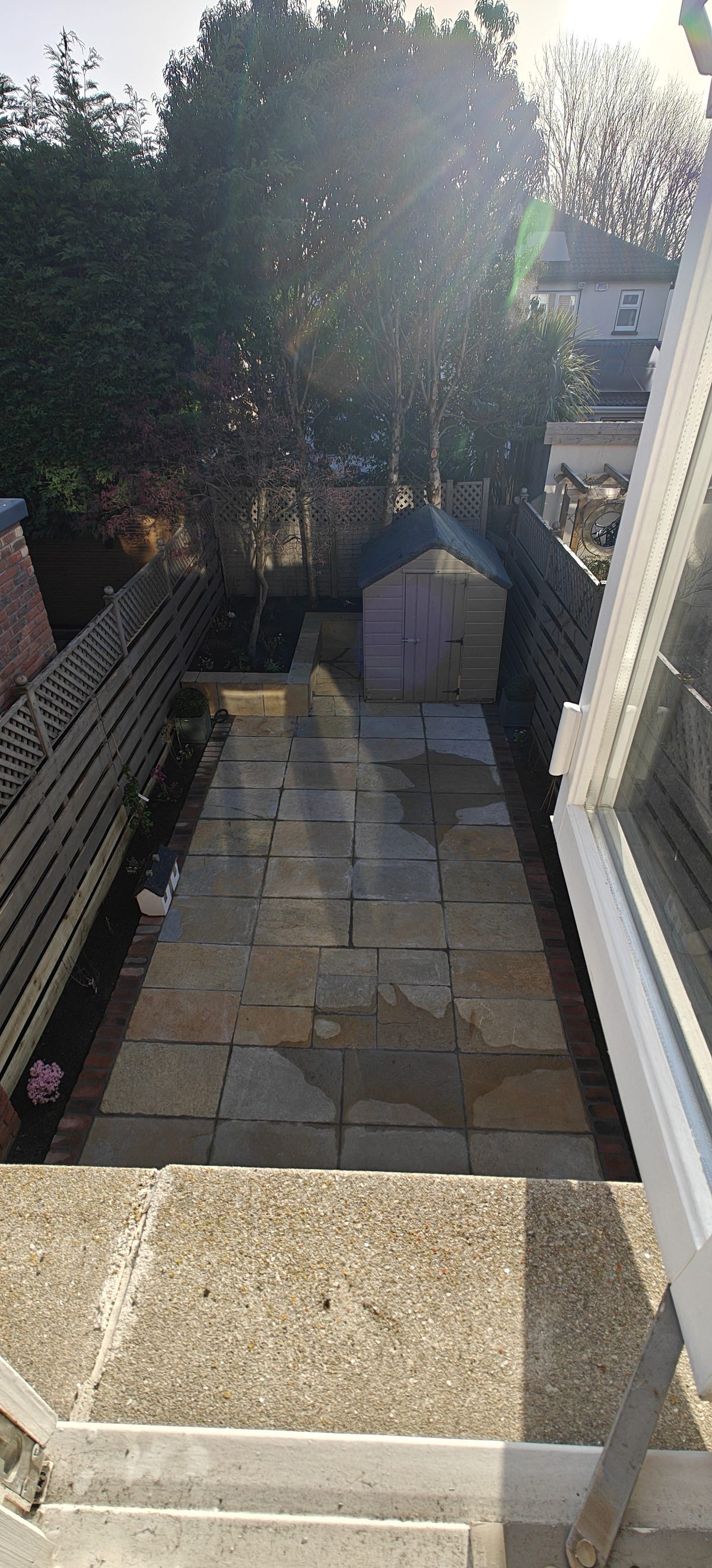 Sandstone patio in a walled garden